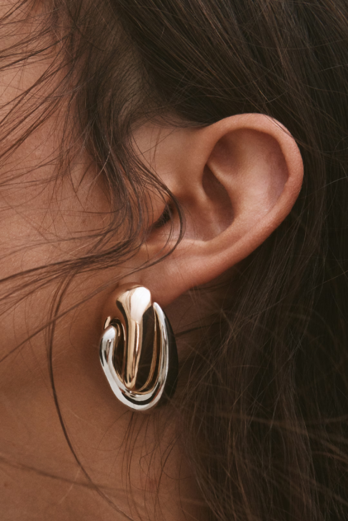 Modern Muse two tone silver and gold earrings styled for modern fall outfits