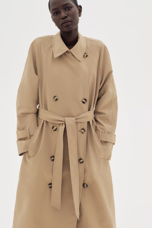 Modern Muse fall outfit with double breasted trench coat in neutral beige styled for timeless autumn looks