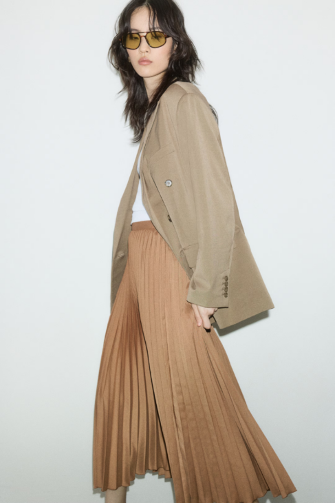 Modern Muse pleated skirt in caramel tone styled with blazer for autumn looks
