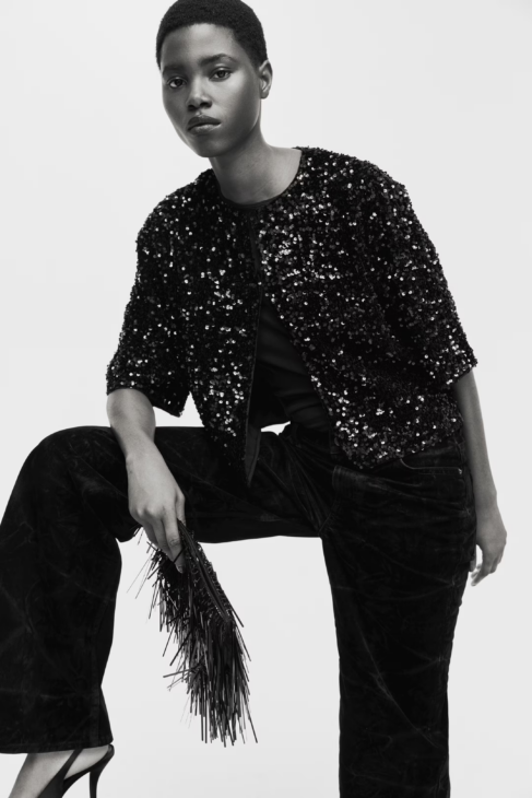 Sequined cardigan layered for textured winter elegance
