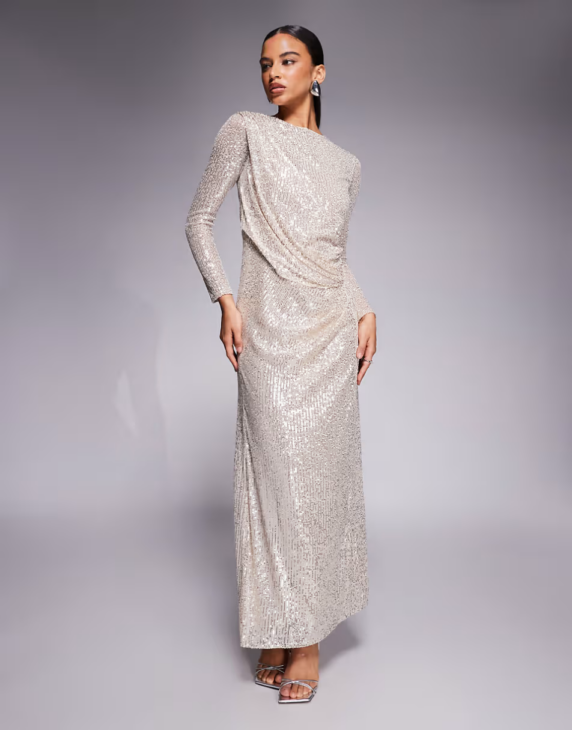 Sequin maxi dress styled for textured winter elegance with restrained shimmer
