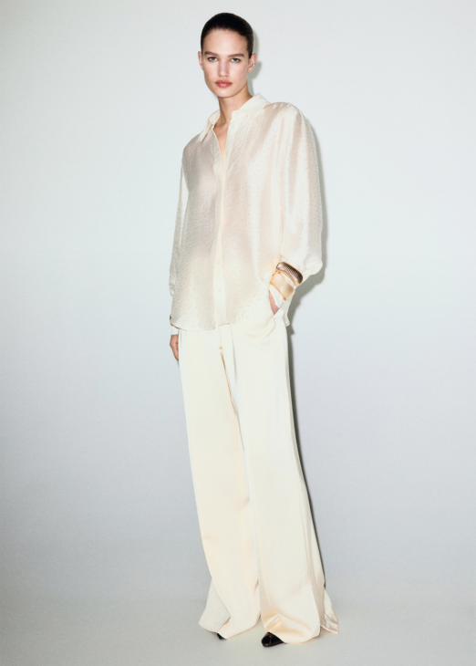 Satin shirt with rhinestones styled for refined winter elegance