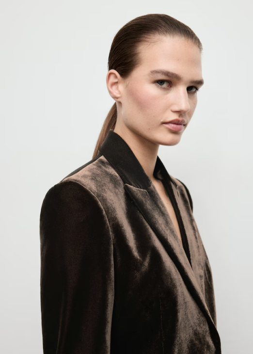 Structured velvet blazer styled for textured winter elegance