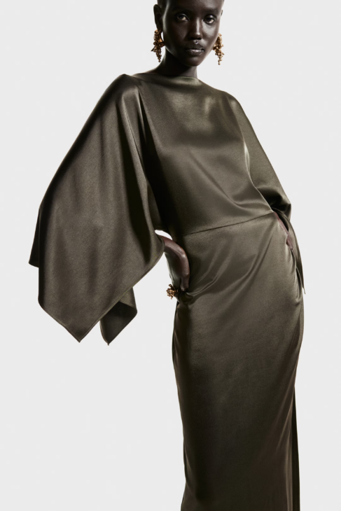 Satin cape dress with fluid movement for modern winter elegance