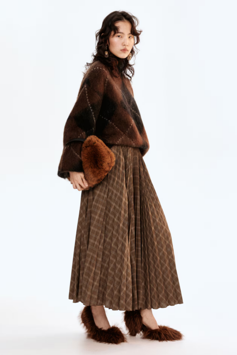 Modern Muse pleated circular skirt in warm brown tones styled for fall outfits