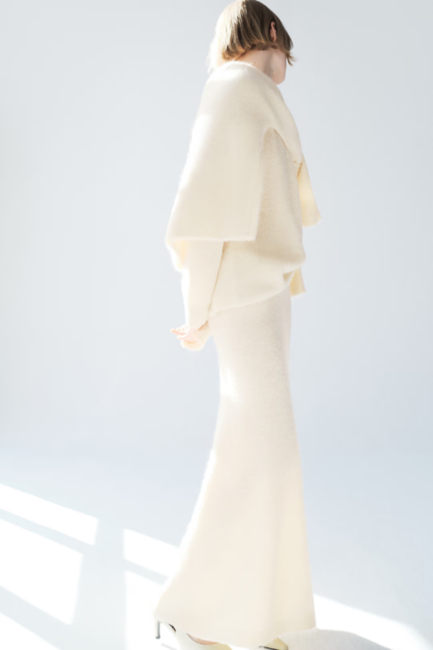 Soft alpaca blend skirt in neutral winter white tone for elegant outfits