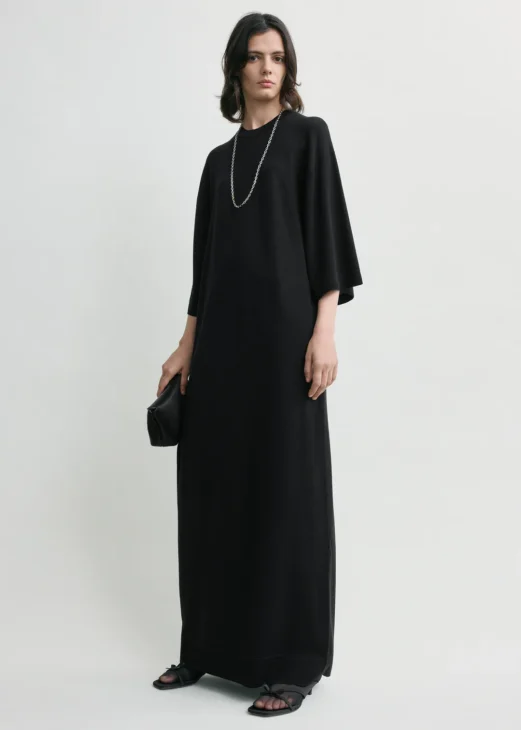 Black knit maxi dress styled in a modest outfit