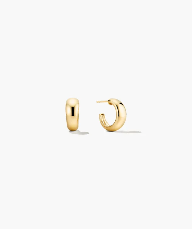 Minimal gold hoop earrings in a refined modest look