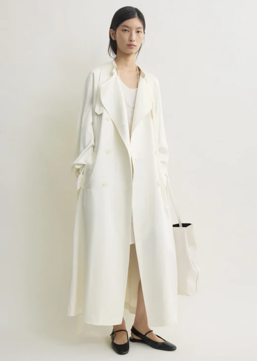 Draped satin trench coat styled in a refined modest outfit